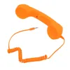 An orange retro telephone handset with a coiled cord and a 3.5mm jack is shown against a white background. Náhled obrázku produktu