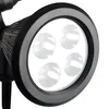 Close-up of a black LED solar spotlight with a gray ring around the lights. Voir les images du produit