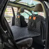 The interior of a car with a dog seat cover installed on the back seats. Produktbild-Vorschau