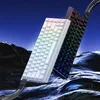 Two keyboards are displayed diagonally against a dark, rocky, and starry background, suggesting a gaming or e-sports theme. Produktbild-Vorschau