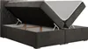 A dark gray upholstered boxspring bed with its mattress and topper lifted to reveal the storage compartment underneath. Produktbild-Vorschau