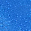 A close-up view of a blue tarp with water droplets on its surface. Produktbild-Vorschau