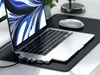 A laptop with a docking station attached, connected to a mouse and external monitor, on a desk. Produktbild-Vorschau