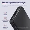 A close-up of a black power bank with text and icons describing its features. Produktbild-Vorschau