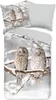 A bedding set with a snowy owl print, including a duvet cover and pillowcase. Produktbild-Vorschau