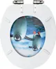 A toilet seat with a printed image of two penguins on it. Náhľad obrázku produktu