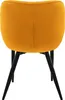 The back view of a single mustard yellow velvet dining chair with black legs, isolated on a white background. Náhled obrázku produktu
