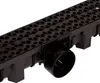 A close-up, angled view of a black drainage channel with a hexagonal grate pattern and a circular outlet pipe. Anteprima dell’immagine prodotto