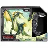 The image shows a Dungeons & Dragons action figure of a dragon named Rakor, presented in its retail packaging. The packaging features artwork of the dragon breathing fire and a smaller image of the actual toy figure. The background of the packaging is dark Produktbild-Vorschau