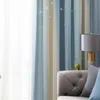A close-up view of striped curtains with small star-like embellishments, partially obscuring a sofa and a lamp. Náhled obrázku produktu