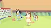 Four cartoon dogs playing soccer in a yard with a goal. Náhled obrázku produktu