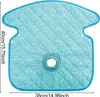 A turquoise quilted pad with a hole in the center, designed to be placed on a car seat or stroller. Produktbild-Vorschau