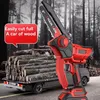 A red and black mini chainsaw is shown in the foreground, with a truck loaded with logs in the background. A red speech bubble with text is also present. Produktbild-Vorschau