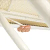 A hand is shown gripping a part of an ironing board. Voir les images du produit