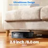 A robot vacuum cleaner is shown sliding under a couch, highlighting its slim design. Produktbild-Vorschau