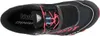 A top-down view of a black Dynafit running shoe with pink laces and blue lace locks. Produktbild-Vorschau