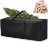 A black storage bag with a Christmas tree partially inside, and a stack of firewood in the background. Produktbild-Vorschau