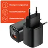 A close-up of a black USB-C charger and a black power adapter, with an orange overlay in the top left corner listing safety features. Produktbild-Vorschau