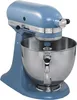 A blue KitchenAid Artisan stand mixer with a stainless steel bowl. Podgląd zdjęcia produktu