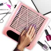 A hand with purple nail polish is placed on a pink nail dust collector, surrounded by nail care tools and polish bottles. Anteprima dell’immagine prodotto