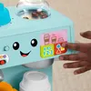 A child's hand is pressing a button on a toy coffee maker. Produktbild-Vorschau