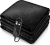 A folded black electric blanket with a controller. Produktbild-Vorschau