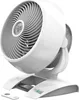 A white table fan with a remote control. Produktbild-Vorschau