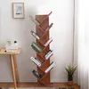 A wooden bookshelf with books on a white wall background. Podgląd zdjęcia produktu