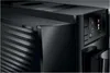 A close-up view of the side and front of a black coffee machine. Anteprima dell’immagine prodotto