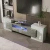 A modern living room with a TV stand and a large television. Anteprima dell’immagine prodotto