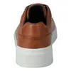 The back view of a brown sneaker with a white sole. Produktbild-Vorschau