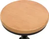 A close-up view of the top of a wooden bar stool with a black base. Produktbild-Vorschau