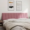 A bedroom scene with a pink velvet headboard and bedding. Produktbild-Vorschau