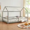 A child's house bed with fairy lights and stuffed animals in a bedroom. Anteprima dell’immagine prodotto