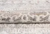 A close-up view of a folded rug with a textured pattern. Anteprima dell’immagine prodotto