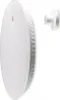 A white kitchen scale and its magnetic wall mount are shown against a white background. Produktbild-Vorschau
