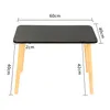 A black rectangular table with wooden legs is shown from a front-side angle, with dimensions indicated by lines and text. Produktbild-Vorschau