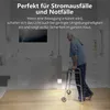 An elderly man with a walker is in a bathroom, illuminated by a small LED light on the wall. Anteprima dell’immagine prodotto