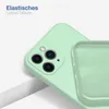 A close-up shot of a light green silicone phone case, showing the camera cutout and the interior texture. Produktbild-Vorschau
