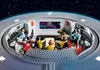 The bridge of the Starship Enterprise, with figures seated at various consoles. Náhľad obrázku produktu