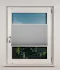 A window with a pleated blind and a view of trees and sky. Produktbild-Vorschau