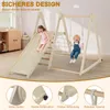 Two children are playing on a wooden indoor playground set with a slide and a swing. Podgląd zdjęcia produktu