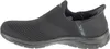 Side view of a black Skechers slip-on sneaker. Voir les images du produit
