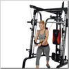 A woman is using a multi-gym machine. Produktbild-Vorschau