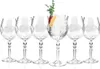 A set of six crystal cocktail glasses, with one glass filled with ice, fruit slices, and a sprig of greenery. Produktbild-Vorschau