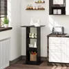 A kitchen scene with a black bar table with shelves, a toaster, and cabinets. Produktbild-Vorschau