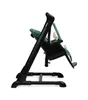 A side view of a green and black baby high chair on a white background. Produktbild-Vorschau