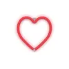 A red neon heart-shaped lamp on a white background. Voir les images du produit