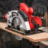 A person wearing black gloves is using a red and silver circular saw to cut a wooden plank. Sawdust is visible. Produktbild-Vorschau