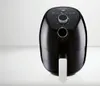A black air fryer is shown against a white and light gray background. Produktbild-Vorschau